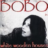 Bobo in white wooden houses - Passing stranger