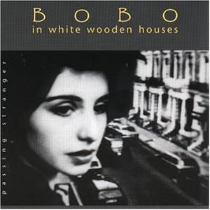 Bobo in white wooden houses - Passing stranger