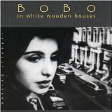 Bobo in white wooden houses - Passing stranger